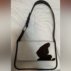 Women Nine West bag outside fur